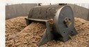 Grinding prepared biomass into uniform particles